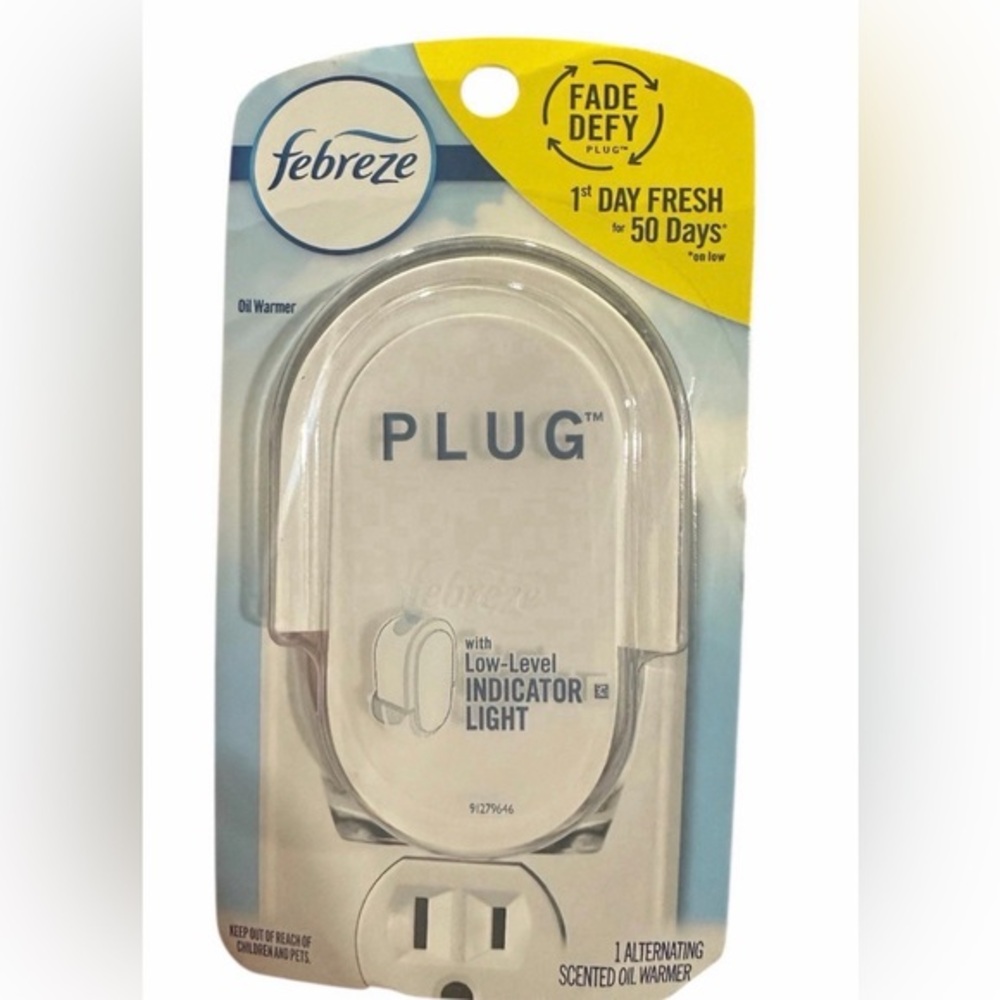 Febreze Plug Air Freshener Scented
Oil Warmer